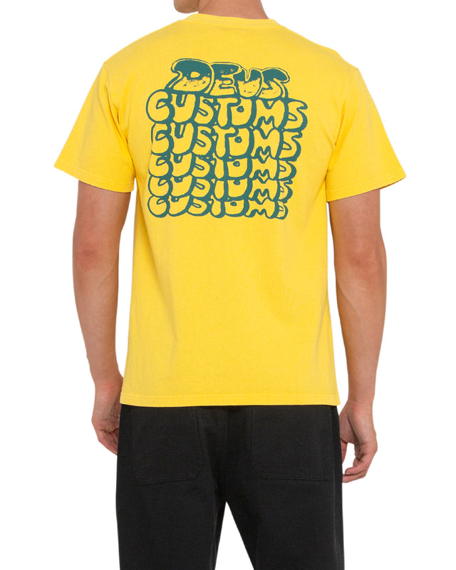 yellow box fit t-shirt with front and back prints, 280gm heavy 100% organic cotton rugby jersey fabrication, garment dyed with a heavy enzyme stone wash