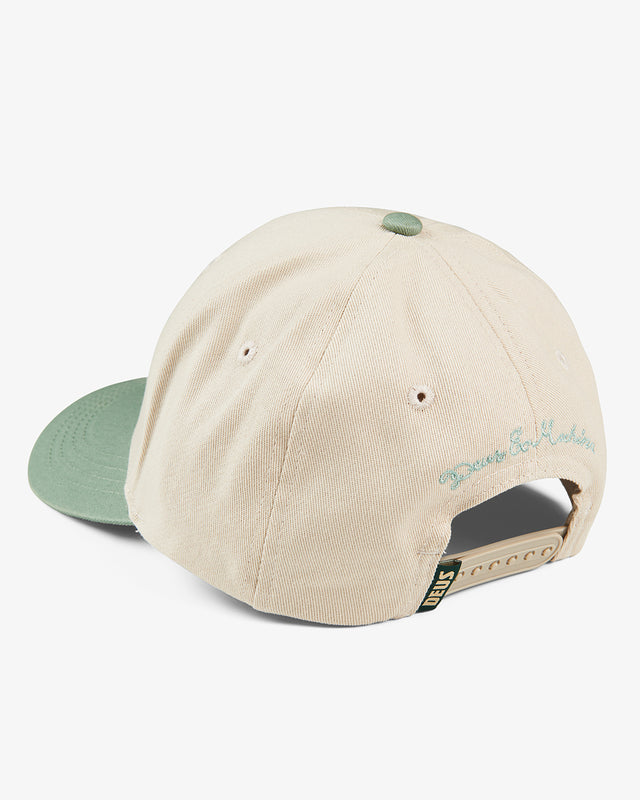 green and white classic fit baseball cap with embroidered front and side art, contrast colour brim, plastic back snap adjuster, 100% cotton twill fabrication