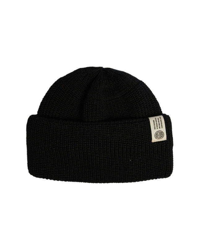 black classic black watch cap beanie with branded label, double fold turnover, circular knit crown construction 50% wool 50% acrylic yarn fabrication